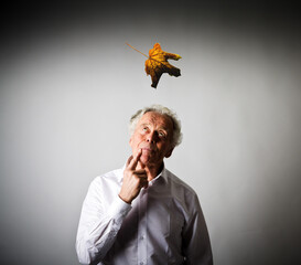 Old man and falling leaf.
