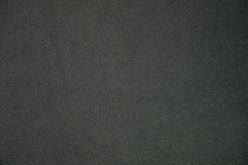 Fototapeta na wymiar Fleece, polar or Blanket black color fabric texture background.