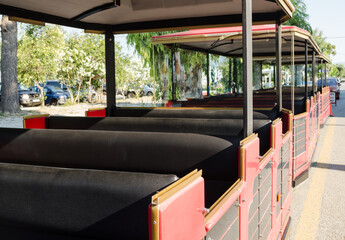 Evia island, Greece - June 30. 2020: Tourist train on the streets of the island of Evia, Greece 