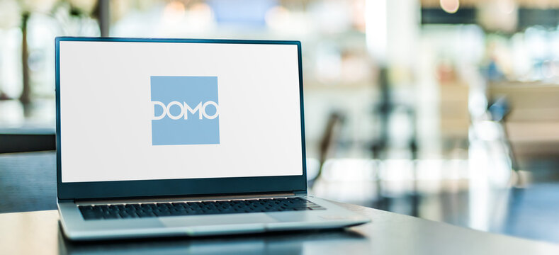 Laptop computer displaying logo of Domo