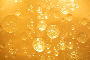 golden yellow bubble oil droplet, abstract background