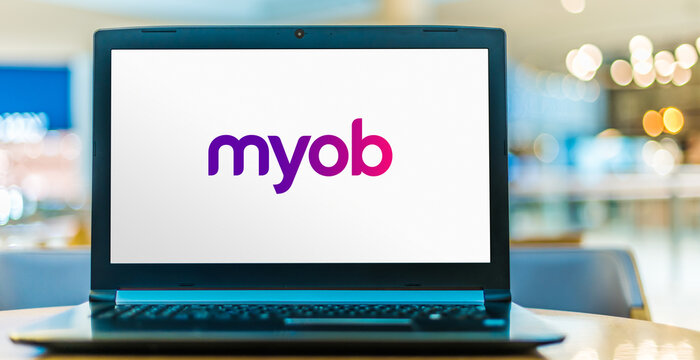 Laptop computer displaying logo of MYOB
