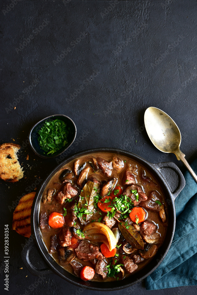 Wall mural beef bourguignon - meat stew with vegetables and mushrooms with red wine, traditinal dish of french  - Wall murals