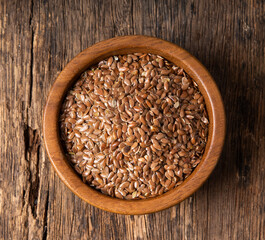 flaxseeds in wood bowl