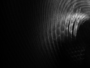 Black and white background texture. Parallel curvy lines. Waves patterns. Much copy space. Rendered texture. Dark shape.