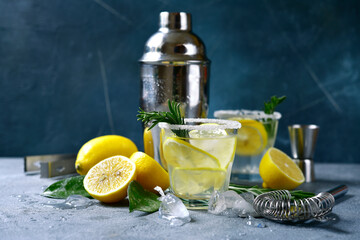 Lemon cocktail with vodka and rosemary.