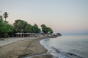 Evia island, Greece - June 28. 2020: Sandy beach in the morning on the island of Evia, Greece 