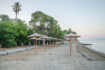 Evia island, Greece - June 28. 2020: Sandy beach in the morning on the island of Evia, Greece 
