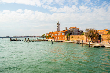 Fototapeta na wymiar View on the lighthouse of Murano, Venice - Italy