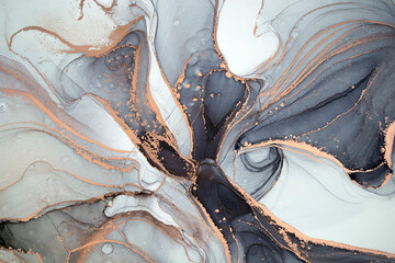 High resolution. Luxury abstract fluid art painting in alcohol ink technique, mixture of black, gray and gold paints. Imitation of marble stone cut, glowing golden veins. Tender and dreamy design. - 392838556