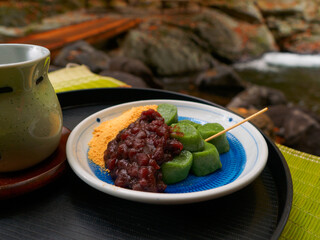 Mugwort dumplings on tray at riverside resting place (Tochigi, Japan)