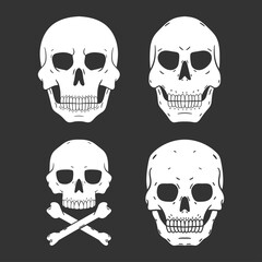 Skulls vector set isolated on a black background.