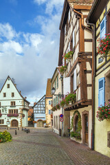 Fototapeta na wymiar Main square in Eguisheim, Alsace, France