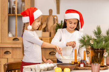 Fototapeta premium Happy family having fun at home, family cooking before christmas