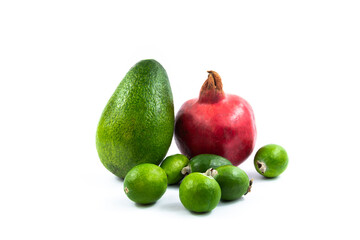 Exotic fruits, beautiful set or assorted, avocado, feijoa, pomegranate, white isolated background, template for the site