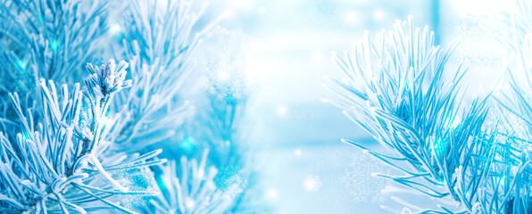Fototapeta na wymiar Blurred festive Christmas background. Pine branch close up, blurry bokeh lights, snowflakes.