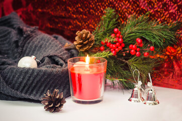 Christmas still life with candle and christmas decorations