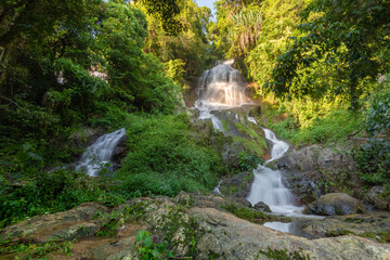 horizontal photo, famous tropical waterfall Namuang during the rainy season on koh samui island in thailand, fresh water in the jungle