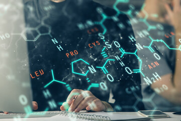 Science formula hologram with man working on computer on background. Education concept. Double...