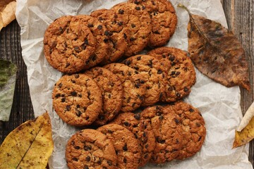 Delicious oatmeal cookies with chocolate on the table