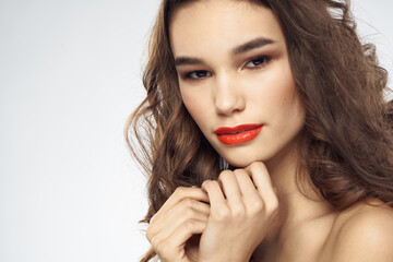 Elegant woman with bare shoulders red lips glamor attractive look cropped look