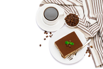 Traditional Italian Tiramisu dessert square portion on ceramic plate and cup of fresh espresso coffee isolated on white