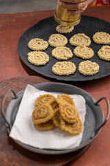 Chakri or Chakli is a spiral shaped savoury snack from India, it is typically made from flours of rice, brown chickpea and black gram.