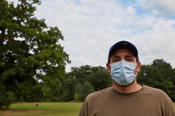 photograph of a man with a mask