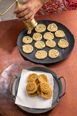 Chakri or Chakli is a spiral shaped savoury snack from India, it is typically made from flours of rice, brown chickpea and black gram.