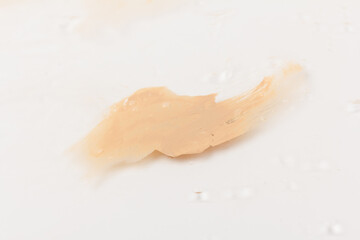 Texture of liquid foundation Background made of liquid foundation Make-up concept. Skin Tone Cream