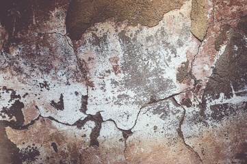 Cracked and peeling paint old wall background.