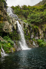 Fototapeta na wymiar Waterfall of Bassin des Aigrettes in Saint-Gilles on Reunion Island