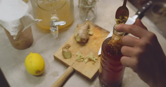 Homemade fermented kombucha with natural probiotic properties.Raw spicy root used for healthy beverage kombucha, fresh pressed juices, and fresh home cooked meals