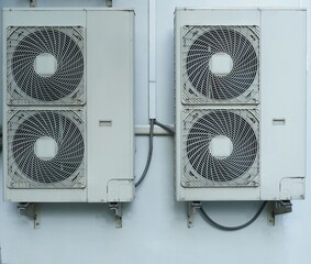 Close-Up a lot of air condition installed on the wall out of building.