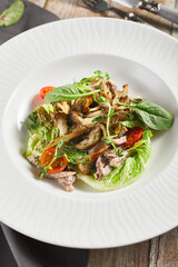 Oyster mushrooms and meat salad plate
