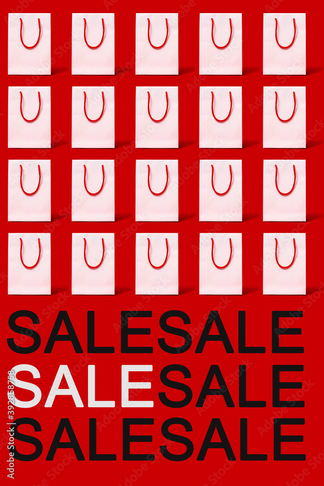 Poster text sale and white shopping bags