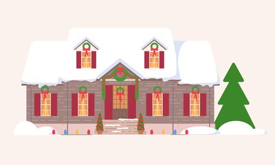Fototapeta premium Big house building decorated with xmas wreath in snowy yard