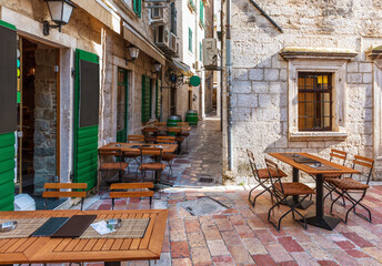 Fototapeta na wymiar Traditional european cafe in Old Town of Kotor, Montenergo, no people