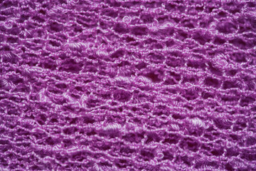 Texture of hand-knitted wool close-up