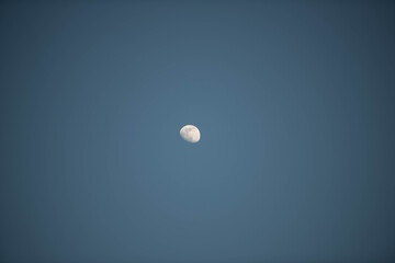  moon over blue sky