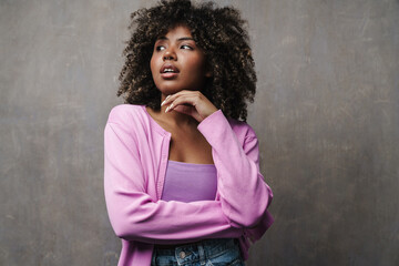 Serious african american woman posing and looking aside