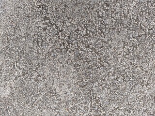 ice covered pavement surface texture and background closeup photo