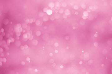 Pink glitter vintage lights background. White bokeh on pink background.
