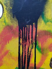 multicolored flowing paint on a bright background photo