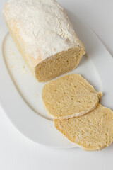Fototapeta na wymiar home made white bread with flour top 