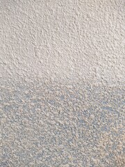 texture and background of white and stained wall with building material