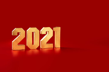 Golden volumetric paper numbers papercraft 2021 on a red background