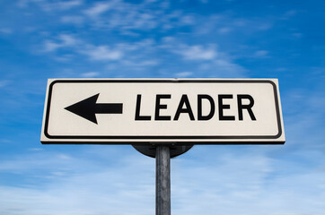 Leader road sign, arrow on blue sky background. One way blank road sign with copy space. Arrow on a pole pointing in one direction.
