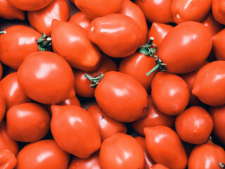 pattern texture, of fresh picked mediterranean red tomatoes, shot up close