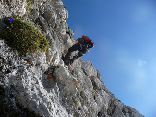 Climber at Hochthron via ferrata in Bavaria, Germany